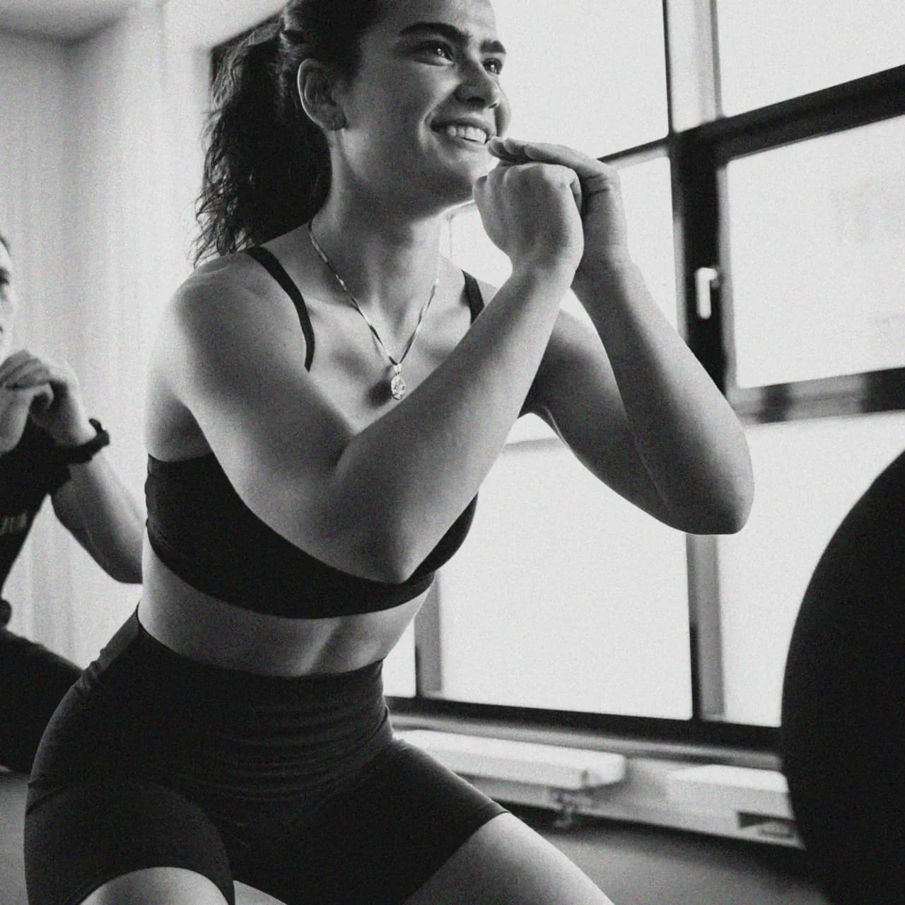 Teilnehmerin beim Kraft- und Ausdauertraining in einem Fitnesskurs bei JIM SSC